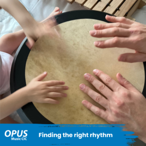 Finding the right rhythm a photo of four hands on the Bodhrán